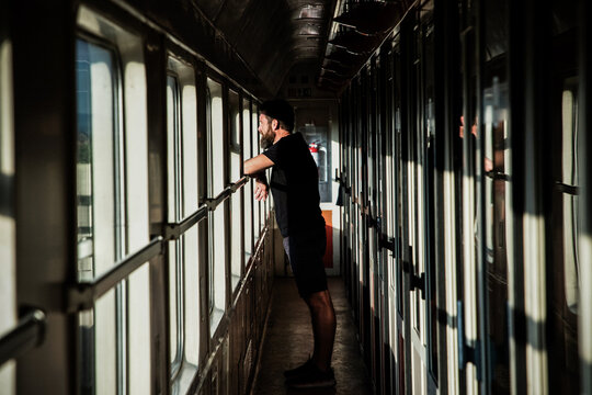 person travelling by train slow travel concept