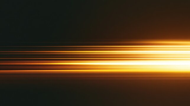 Blurring golden light streaks across dark background