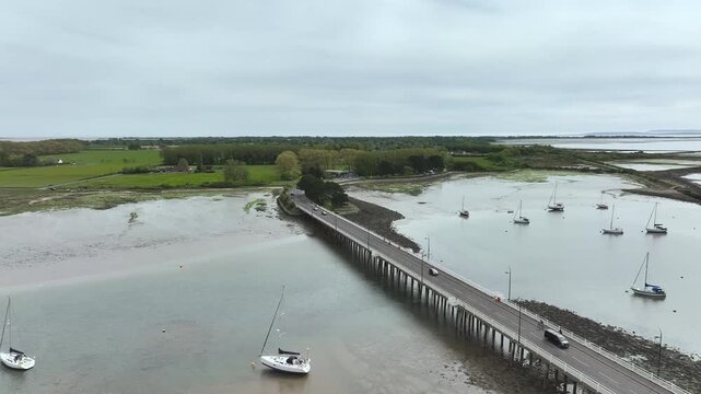 Bridge and Quay to the Hayling Island from a dron at low tide, Havant, Hampshire, England