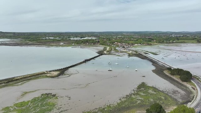 Bridge and Quay to the Hayling Island from a dron at low tide, Havant, Hampshire, England