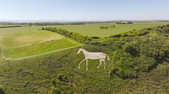 Litlington White Horse over Cuckmere Valley from a drone, Hindover Hill, South Downs, East Sussex, England	