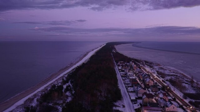 Frozen Bay of Puck near Kuznica at sunset, Hel Peninsula. Poland