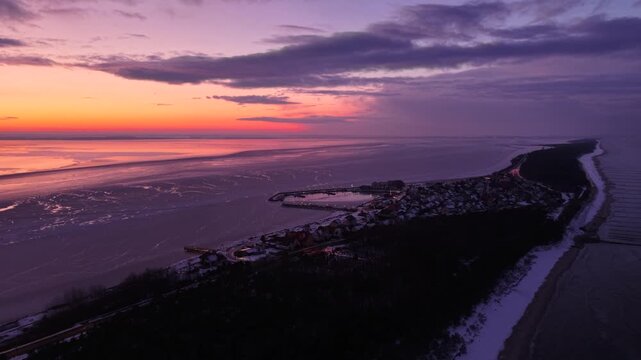 Frozen Bay of Puck near Kuznica at sunset, Hel Peninsula. Poland