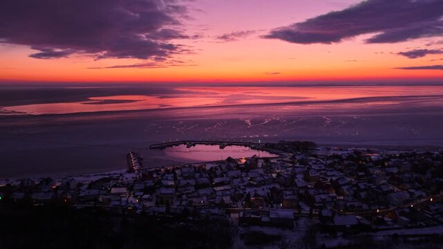 Frozen Bay of Puck near Kuznica at sunset, Hel Peninsula. Poland