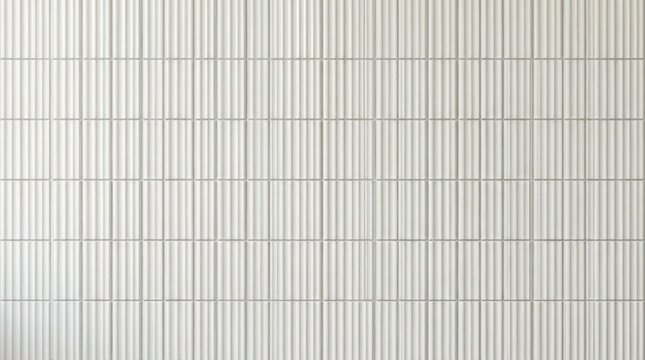 Seamless white fluted ceramic tile texture with vertical ribbed stacked pattern, glossy ceramic wall background for interior design decor