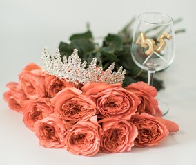 Coral Roses with Tiara and Gold 35 Cake Toppers in Wine Glass © Daisy Heart