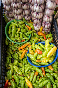 Aromatic chili pepper and garlic on display on street market stall in Sao Paulo, Brazil