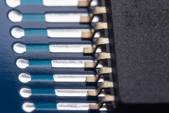 Close-up of electronic component with metallic pins