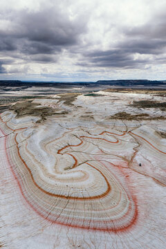 Aerial view of the unique striped rock formations and desert landscape of the Mangystau Region, Kazakhstan.