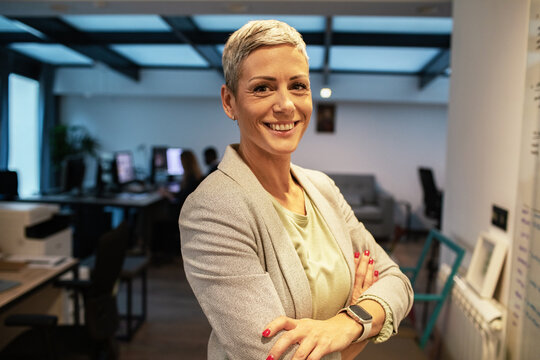 Portrait of confident female executive in modern office