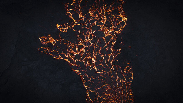 Aerial view of glowing molten lava flowing through dark volcanic rock, creating a high contrast pattern of fire and stone in Reykjavik, Reykjavikurborg, Iceland.