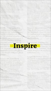 Inspire text - on yellow banner over vintage minimalist white newspaper background