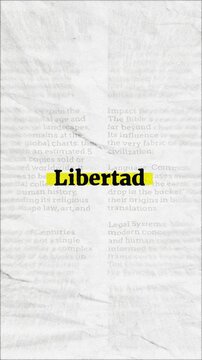 Libertad text - on yellow banner over vintage minimalist white newspaper background