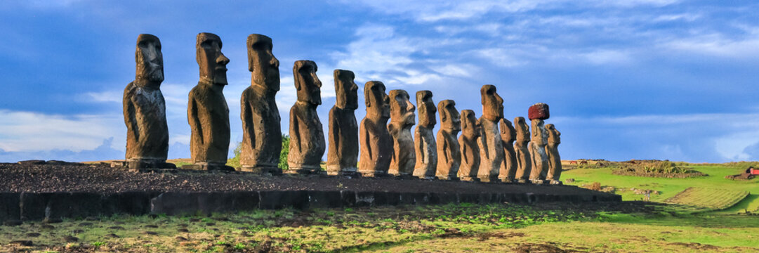 Moai Statues at Ahu Tongariki Standing in a Row Against a Twilight Sky on Easter Island, Valparaiso, Chile