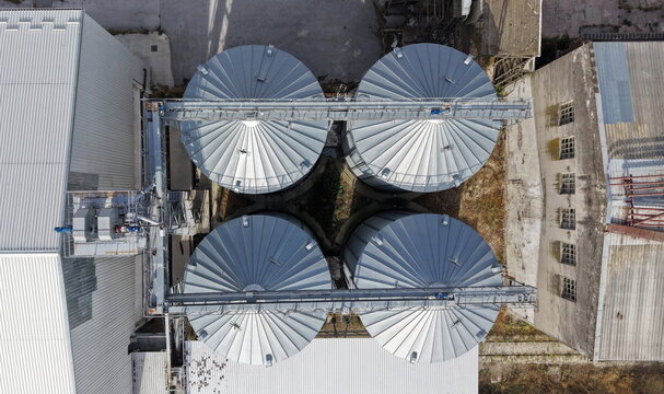 Aerial view of industrial grain silos and storage tanks at a facility in Pancevo, Vojvodina, Serbia.