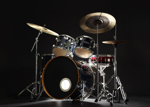 Drum set on black background. Musical instrument