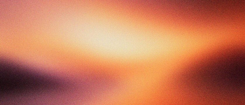Abstract grainy gradient background with warm orange and purple tones. Soft blurred texture for cinematic film aesthetic. Vibrant sunset color transition for modern web design and wallpaper.