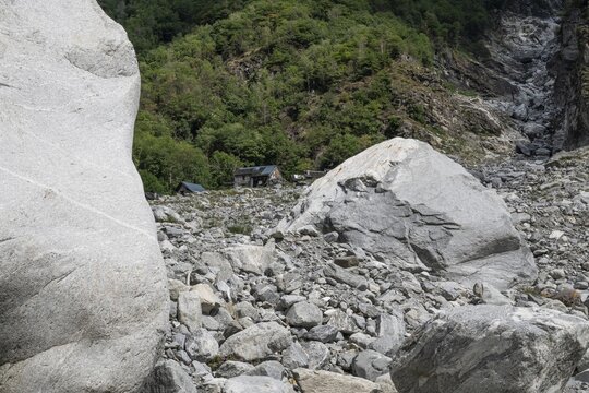 Devastation caused by debris and boulders, as a result of heavy rock and debris flow on the night of June 29-30, 2024 following heavy rains, Fontana hamlet, Bavona Valley or Val Bavona, Maggia Valley, Tessin, Switzerland