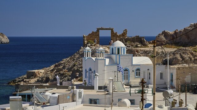 Agios Nikolaos church, coastal landscape with church, ruins and blue sea under clear sky, Palio Ergostasio Kaolini, Old Kaolin loading station, ruins, Firopotamos, fishing village, north coast, beach, north coast, Milos, Cyclades, Greek Islands, Greece