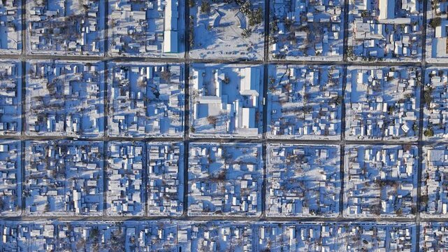 Aerial Top Down Melipeuco Town Grid Snow Roofs Dawn Streets Chile City Urban Landscape