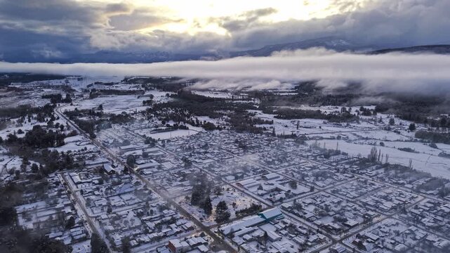 Aerial Establishing View Melipeuco Town Sunset Clouds Snow Roofs Andes Chile
