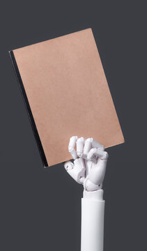 Robotic Hand Presenting Empty Brown Book Cover Concept of AI Learning
