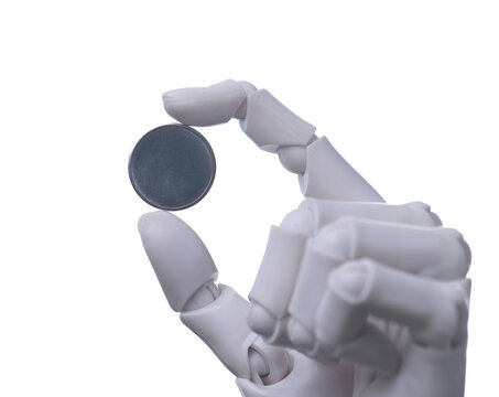 Robotic Hand Holding Blank Metal Coin Isolated on White Background