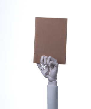 Robotic Hand Presenting Empty Brown Book Cover Concept of AI Learning
