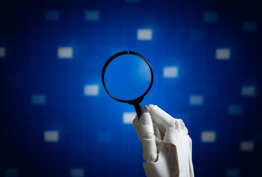 Robot Hand Holding Loupe Concept of Artificial Intelligence Data Search