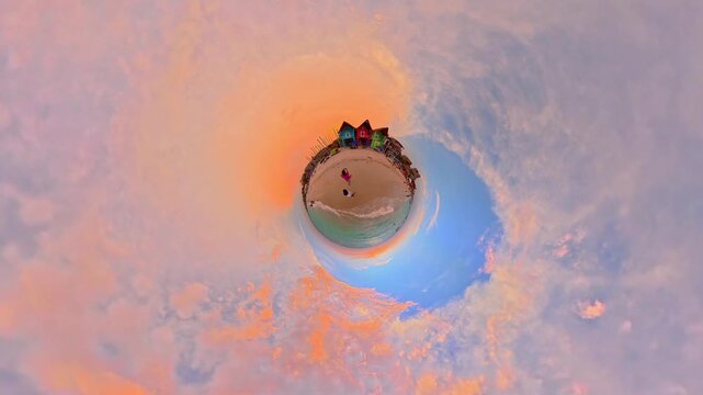 Tiny planet of a caribbean beach at sunset in colombia