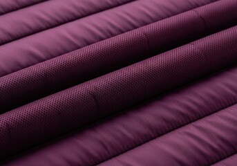 Obraz premium Macro view of dark purple quilted fabric texture.