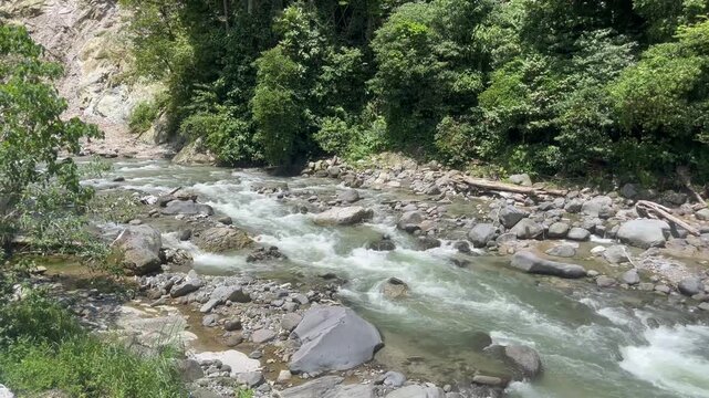 fast flowing river at Anai valley West Sumatera Indonesia