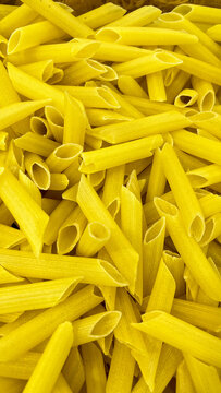 Abundant Penne Pasta Texture Background