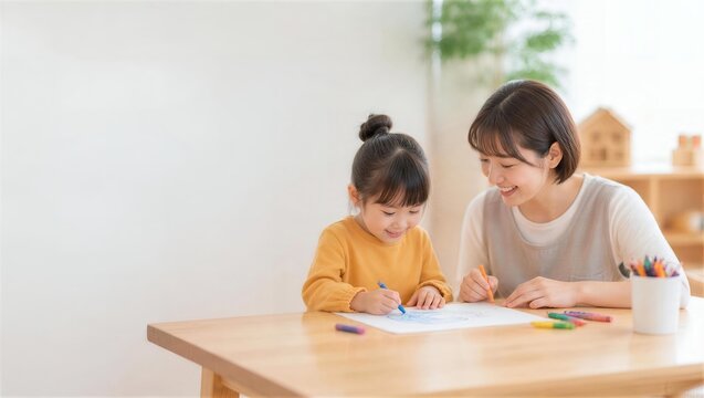 保育士が園児の描画をそばで支える一対一のお絵描き活動