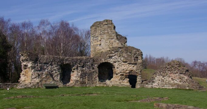 Wide zoom in shot of the northwest tower of Flint castle from the Inner ward,