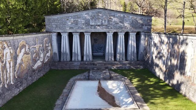 Stone memorial with columns, murals and formal courtyard at Paxmal, Walenstadt, Switzerland