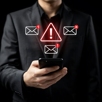 Person checking phone with warning notification and unread email icons overlay