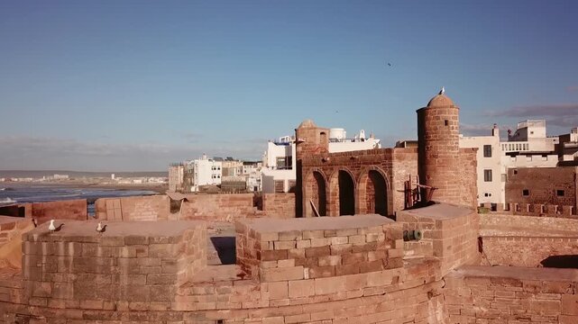 Aerial view of the historic stone fortifications and watchtower of the Skala de la Ville in Essaouira, Marrakesh-Safi, Morocco.