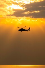 helicopter at sunset © Mubin