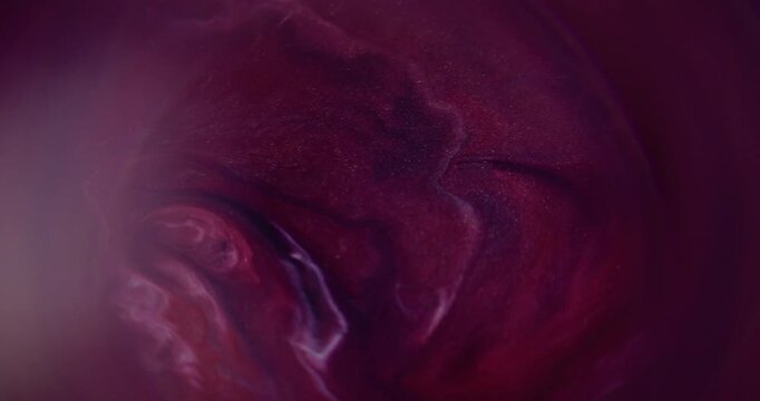 Defocused color spatter. Art particles flow. Purple red blue paint pigment bright water vibrant fluid vivid rainbow glitter wave floating on abstract acrylic background.