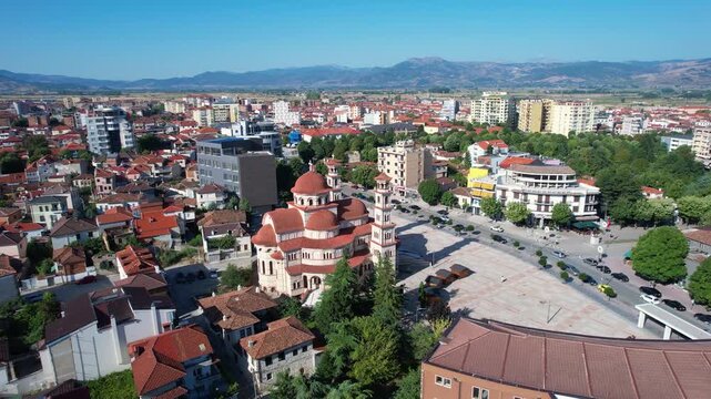 Kor&ccedil;a city center streets near cathedral and quiet boulevard in morning sunshine