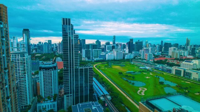Bangkok Morning. Cityscape Timelapse from Night to Day. Twilight from dark to bright. Overlooking the Pathum Wan district of Ratchaprasong, a place of high end residential and commercial area.