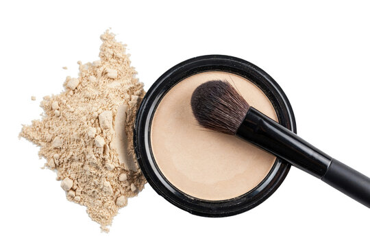 Beige face powder compact with a makeup brush and loose powder pile isolated on a transparent background