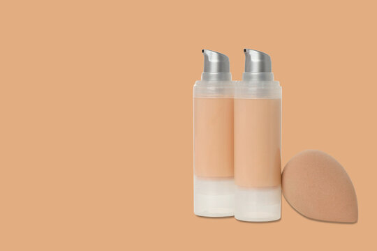 Cosmetics. Cosmetics showcase features foundation bottles alongside beauty sponge