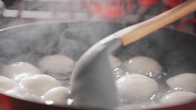  Chinese New Year celebration montage, writing fu character, making dumplings, red lanterns, family reunion dinner Lunar New Year footage