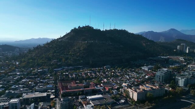 Aerial view of San Cristobal Hill overlooking the urban landscape of Santiago, Santiago Metropolitan, Chile.