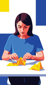 Woman folds yellow paper at a table with abstract shapes