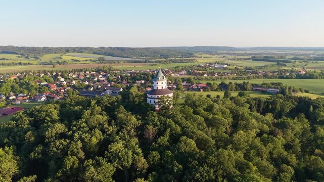 Aerial view of the historic Humprecht hunting lodge surrounded by lush green forests overlooking the town of Sobotka, Kralovehradecky kraj, Czechia.