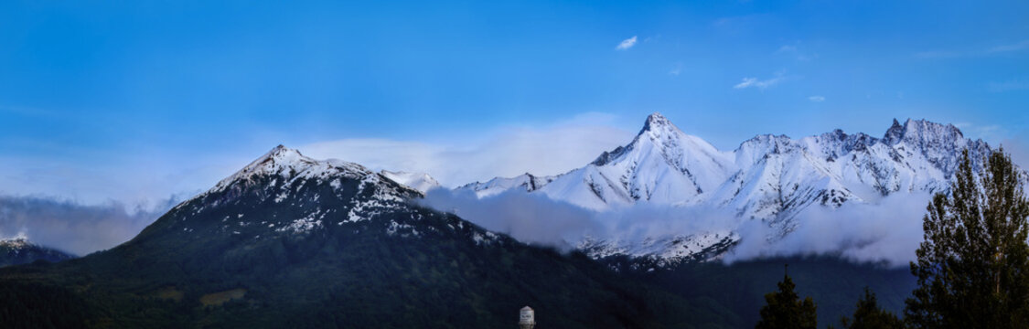 Palmer downtown panoramic autumn landscape with views of the snow covered Chugach Mountains and Talkeetna Mountains in Alaska, USA