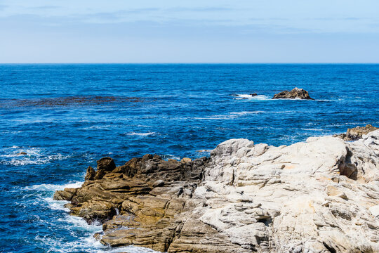 view of rocks in ocean